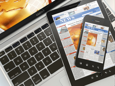 Digital news. Laptop, mobile phone and digital tablet pc